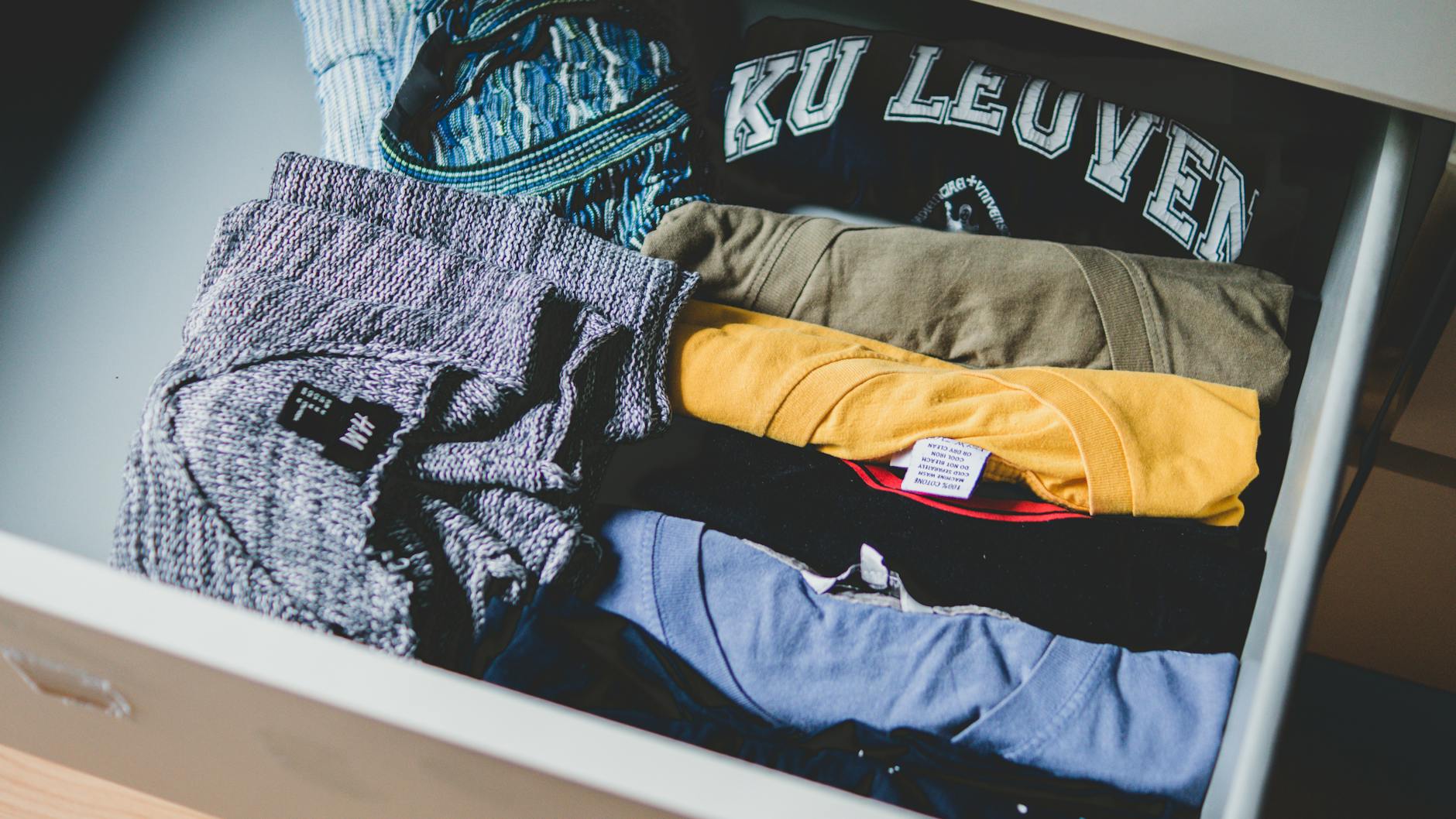folded assorted color shirts
